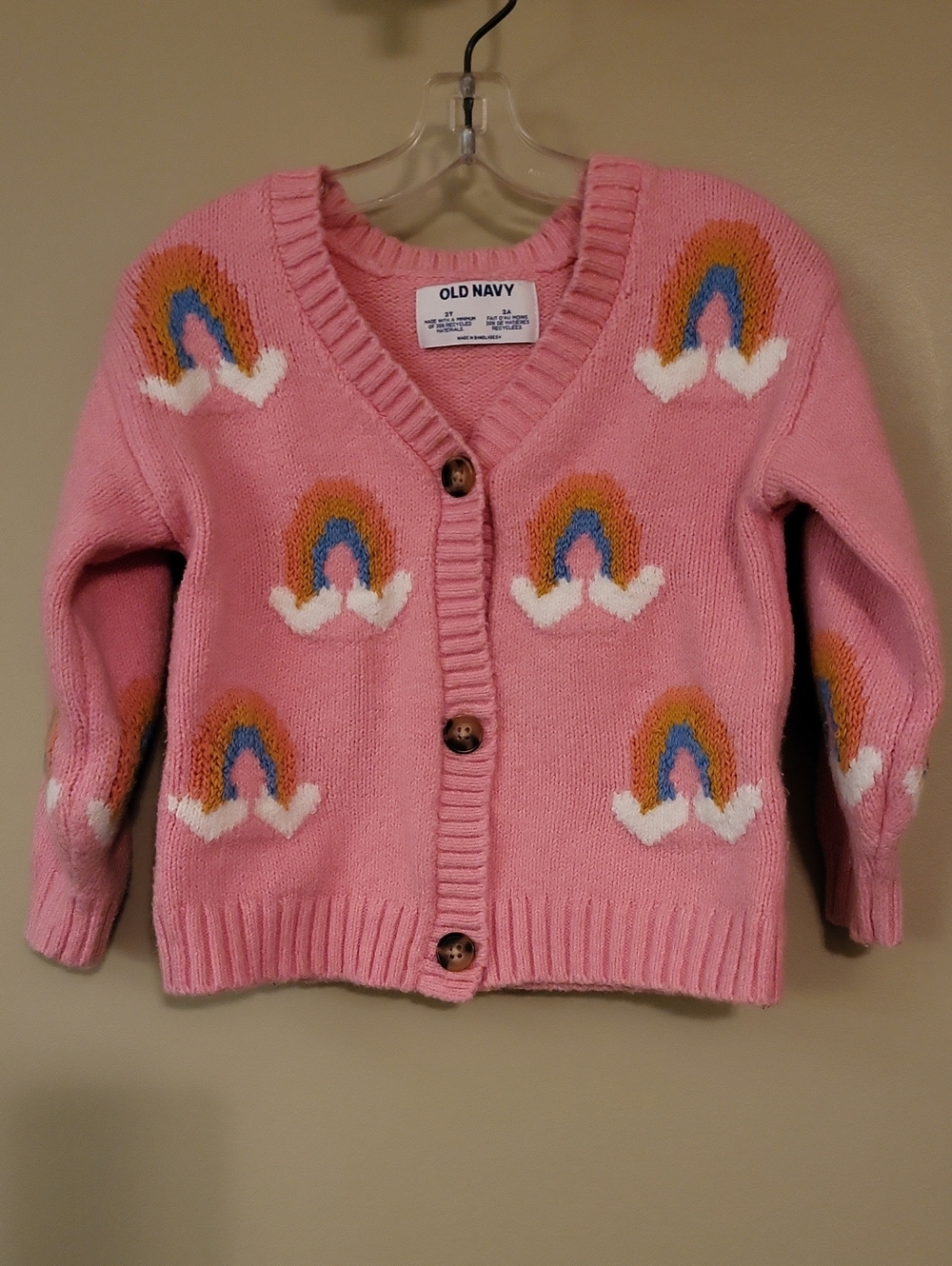 Adorable pink cardigan with heart/rainbow print